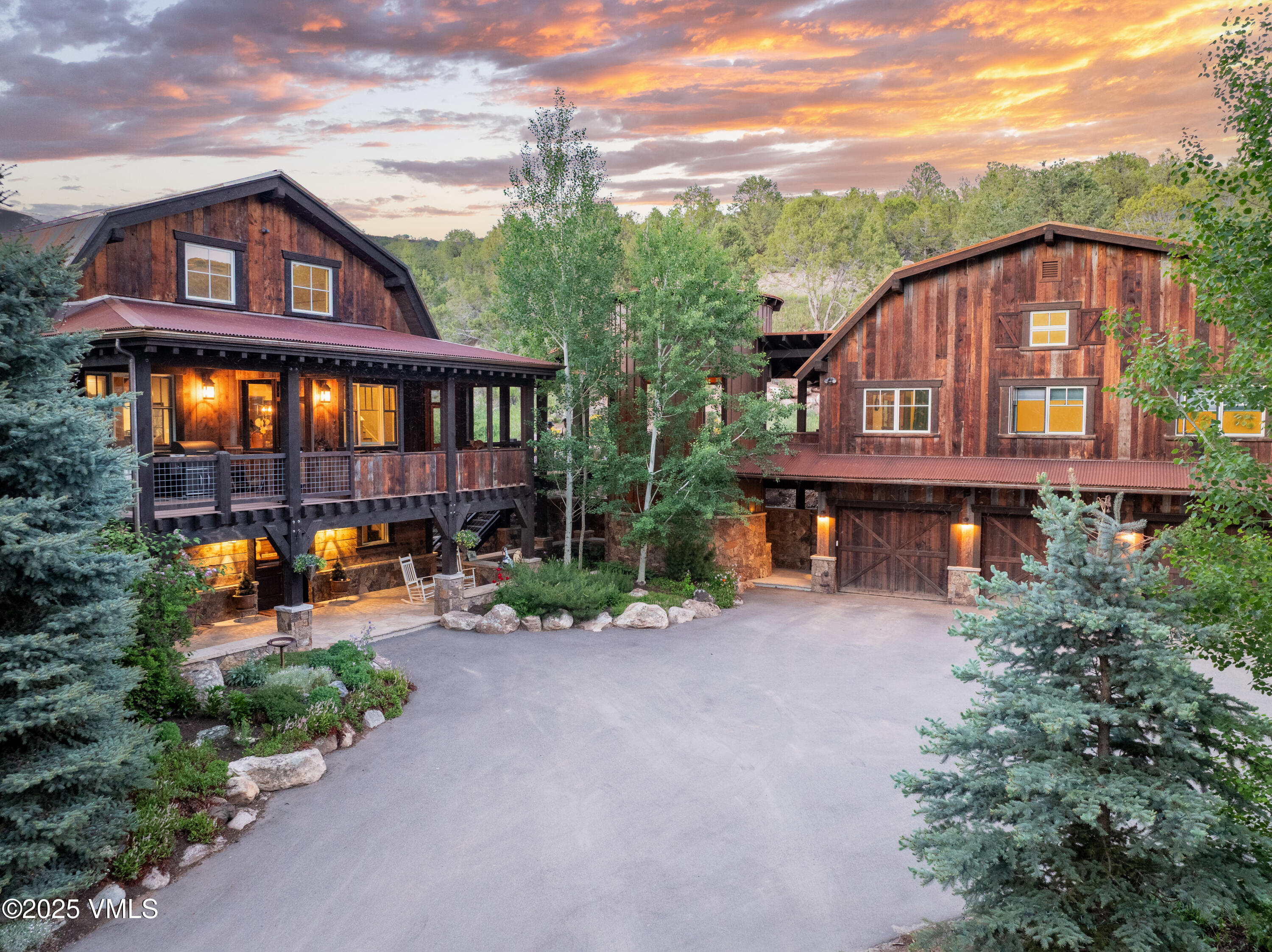 1794 Eby Creek Road Eagle, CO 81631 - Photo 2 of 45 a view of a big house with a big yard and large tree