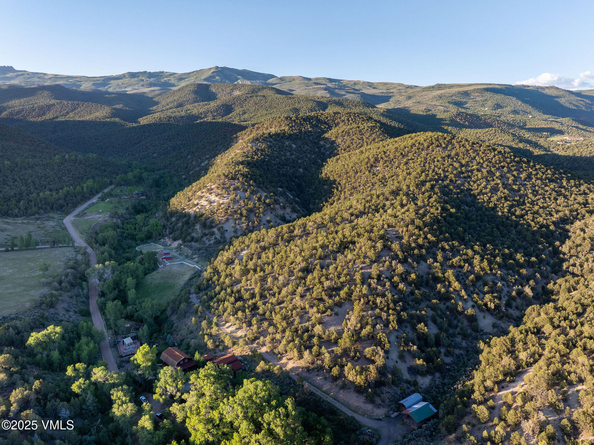1794 Eby Creek Road Eagle, CO 81631 - Photo 4 of 45 a view of a houses with a lush green hillside