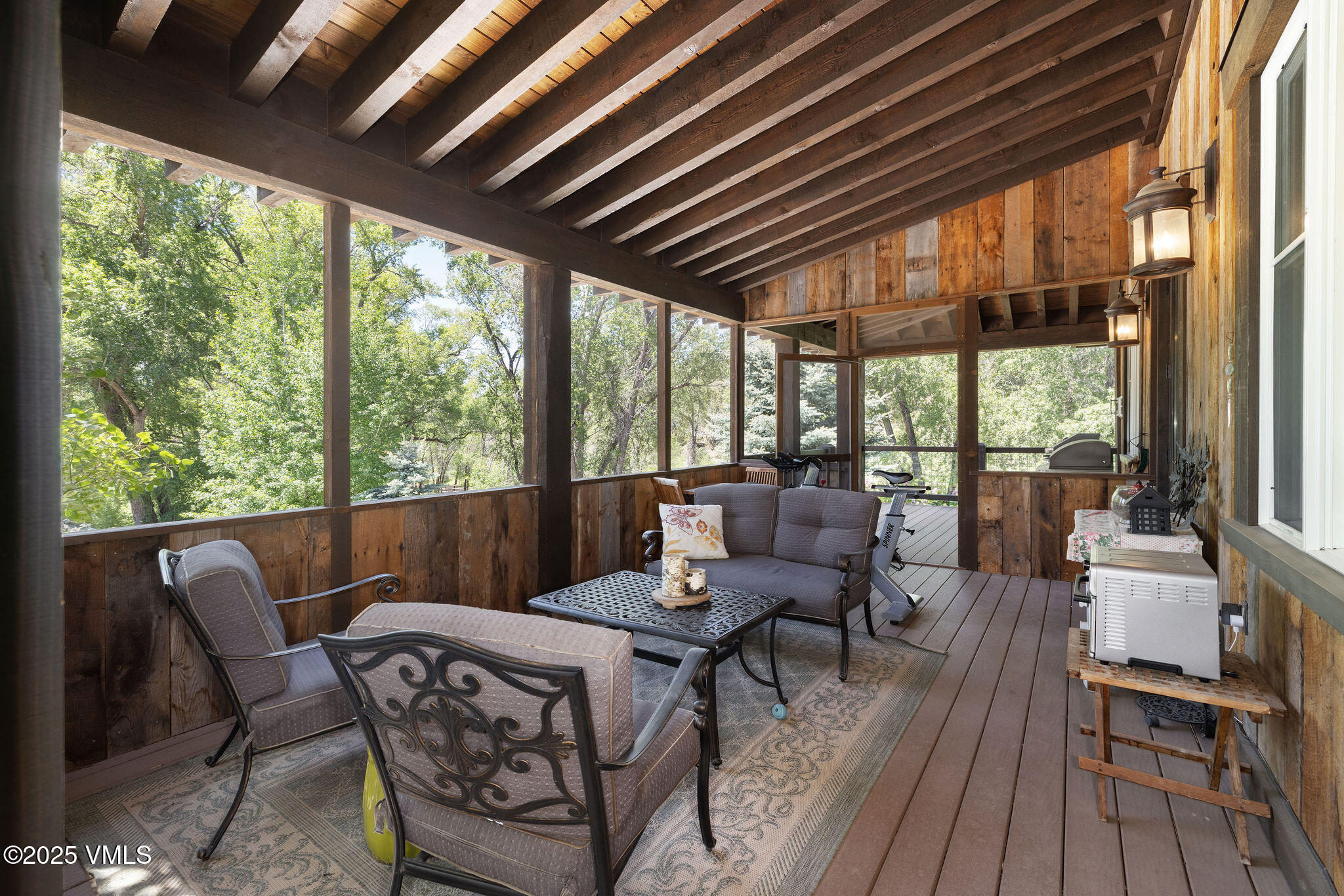 1794 Eby Creek Road Eagle, CO 81631 - Photo 8 of 45 a living room with furniture and a large window