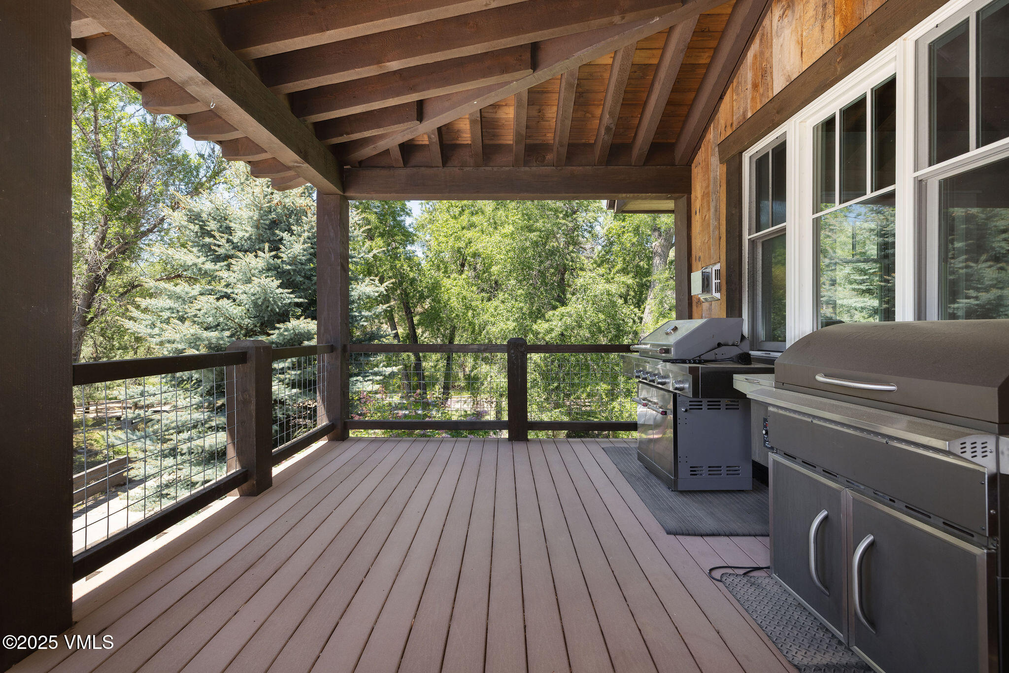 1794 Eby Creek Road Eagle, CO 81631 - Photo 10 of 45 a view of a room with wooden floor and iron stairs
