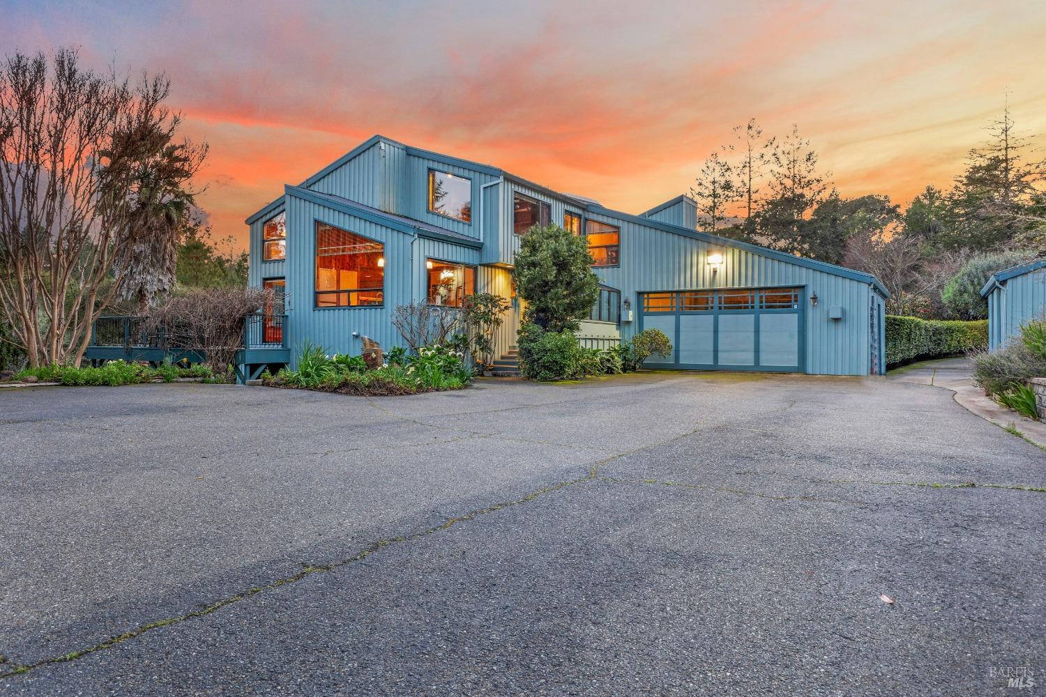 1097 Tilton Road Sebastopol, CA 95472 - Photo 1 of 1 a front view of a house with a yard and garage