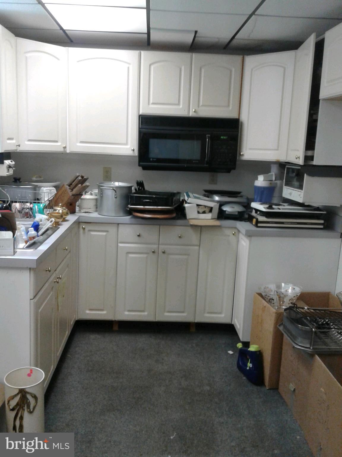 647 Nollmeyer Road Baltimore, MD 21220 - Photo 22 of 26 Basement kitchenette/laundry room