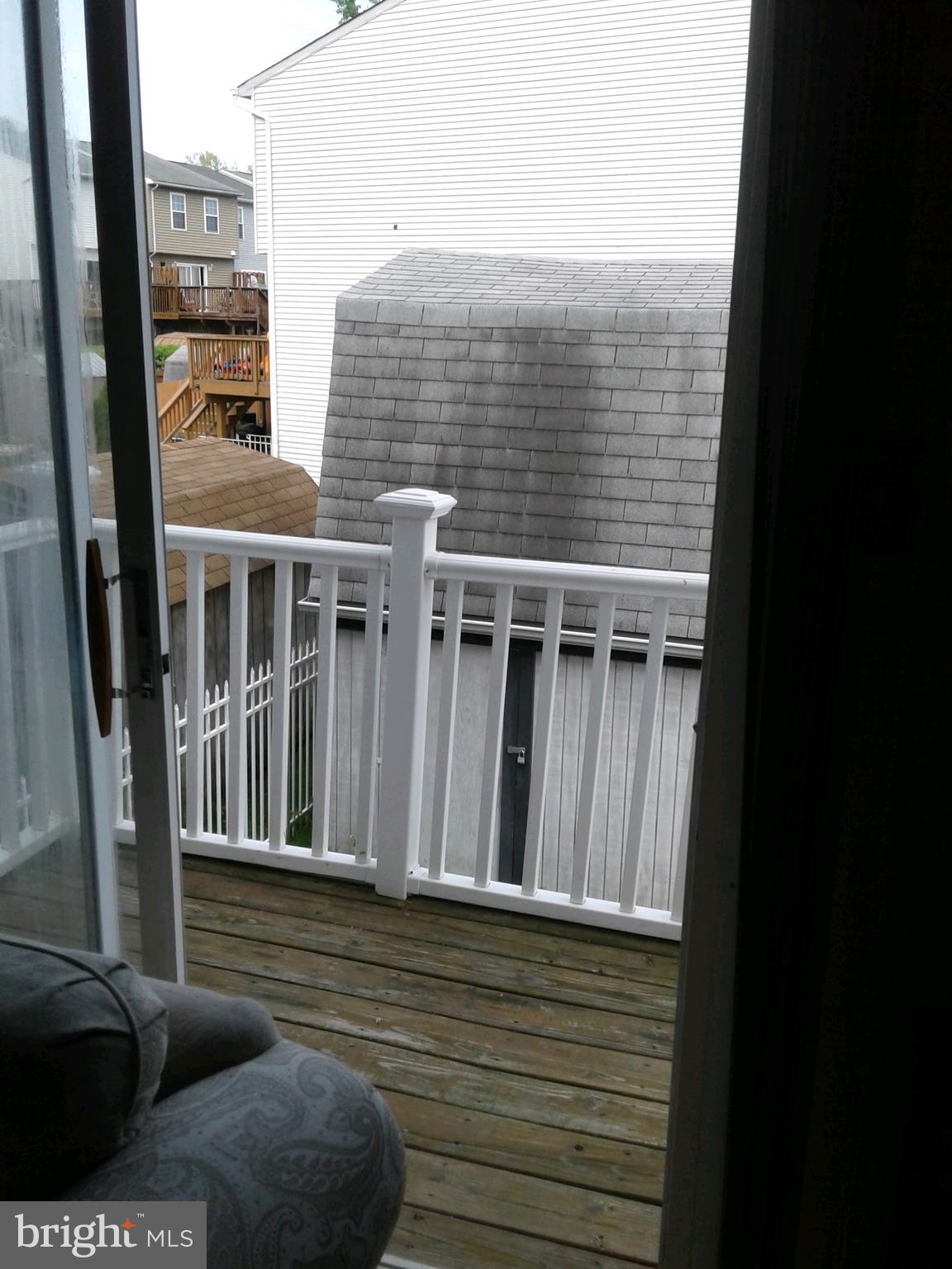 647 Nollmeyer Road Baltimore, MD 21220 - Photo 6 of 26 View to top of deck from living room sliders