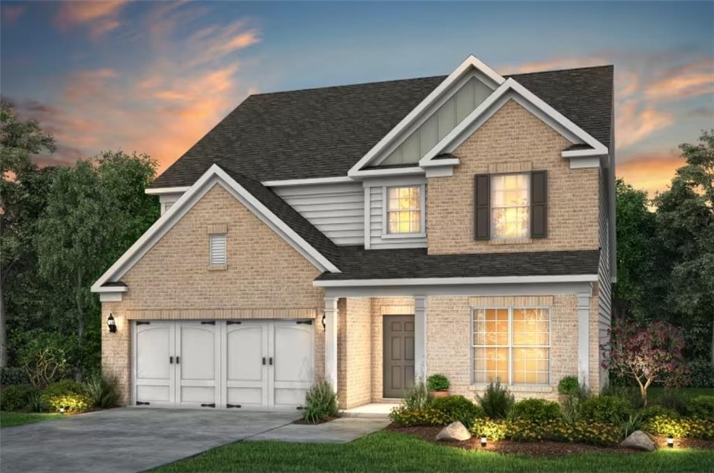 4327 Azalea Ridge Way Hoschton, GA 30548 - Photo 1 of 1 a front view of a house with a yard and garage
