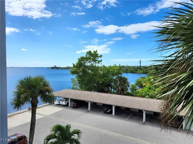 a view of a patio with plants and a table