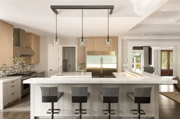 a bath tub sitting in a bathroom next to a window