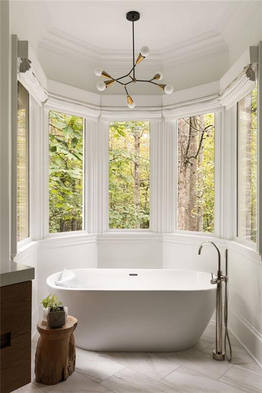 11015 Stroup Road Roswell, GA 30075 - Photo 39 of 113 a bath tub sitting in a bathroom next to a window