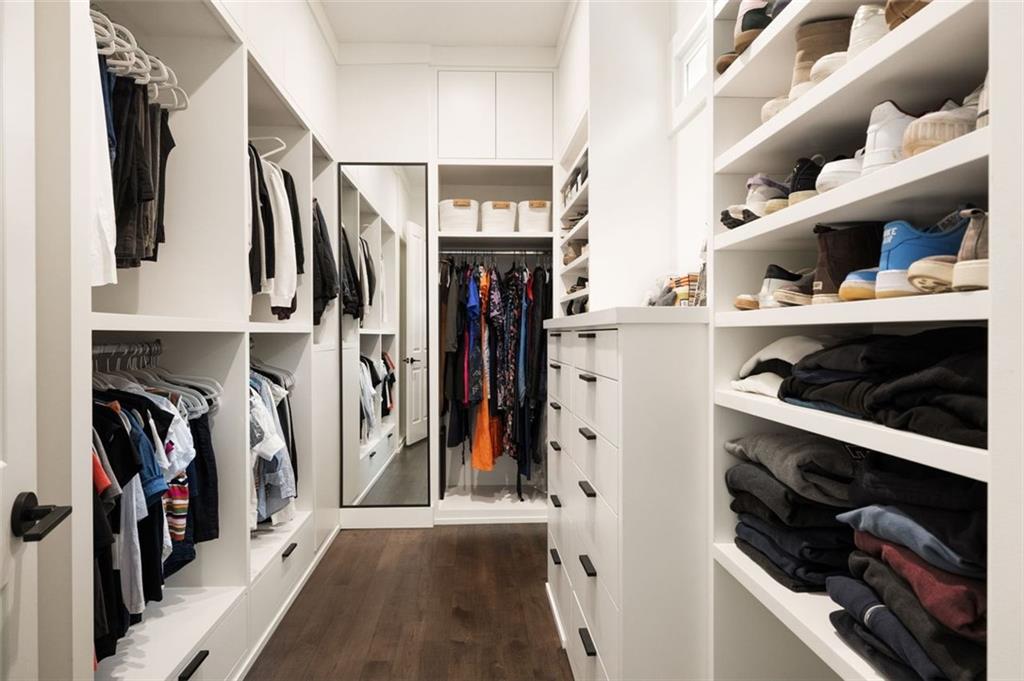 11015 Stroup Road Roswell, GA 30075 - Photo 41 of 113 a view of walk in closet with clothes and shoes