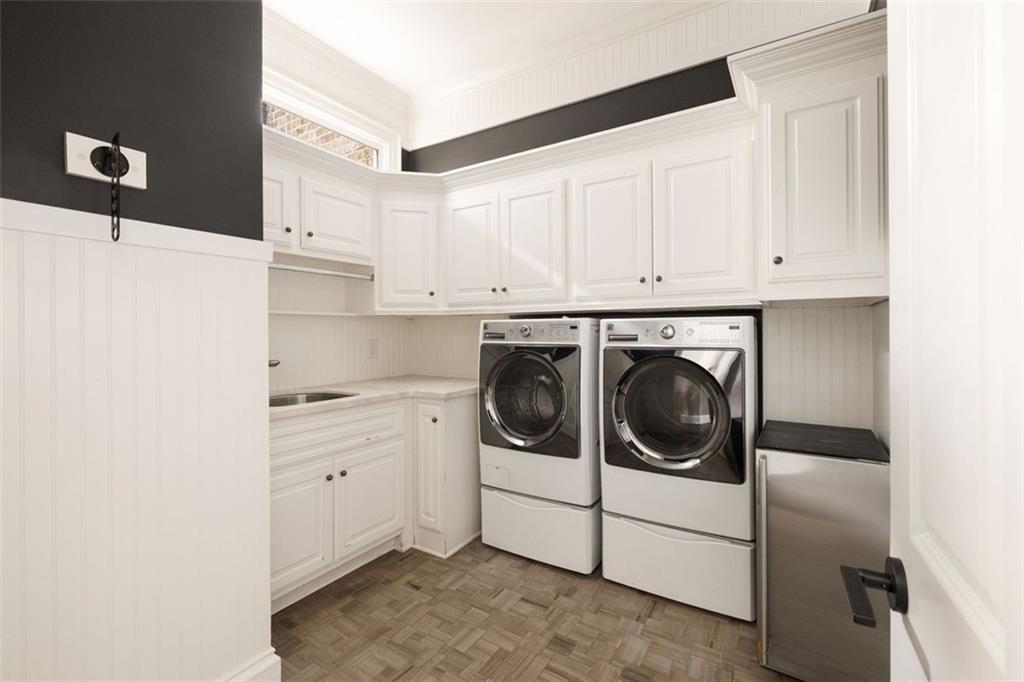 11015 Stroup Road Roswell, GA 30075 - Photo 45 of 113 a utility room with sink dryer and washer