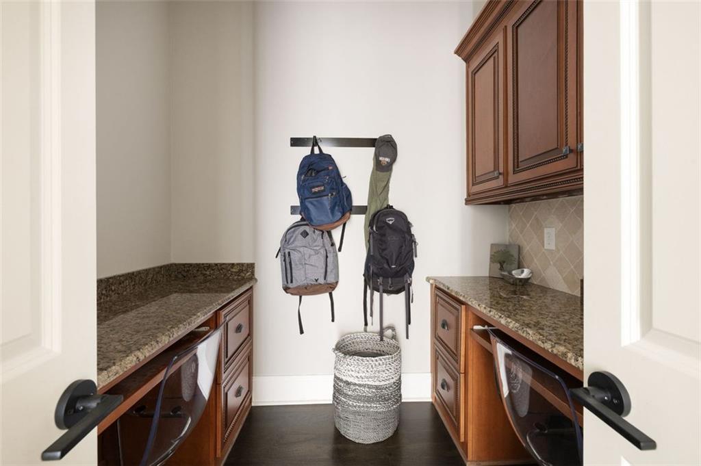 11015 Stroup Road Roswell, GA 30075 - Photo 47 of 113 a kitchen with a sink a stove and cabinets