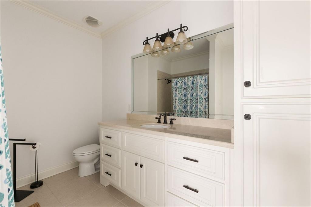 11015 Stroup Road Roswell, GA 30075 - Photo 49 of 113 a bathroom with a double vanity sink mirror and toilet