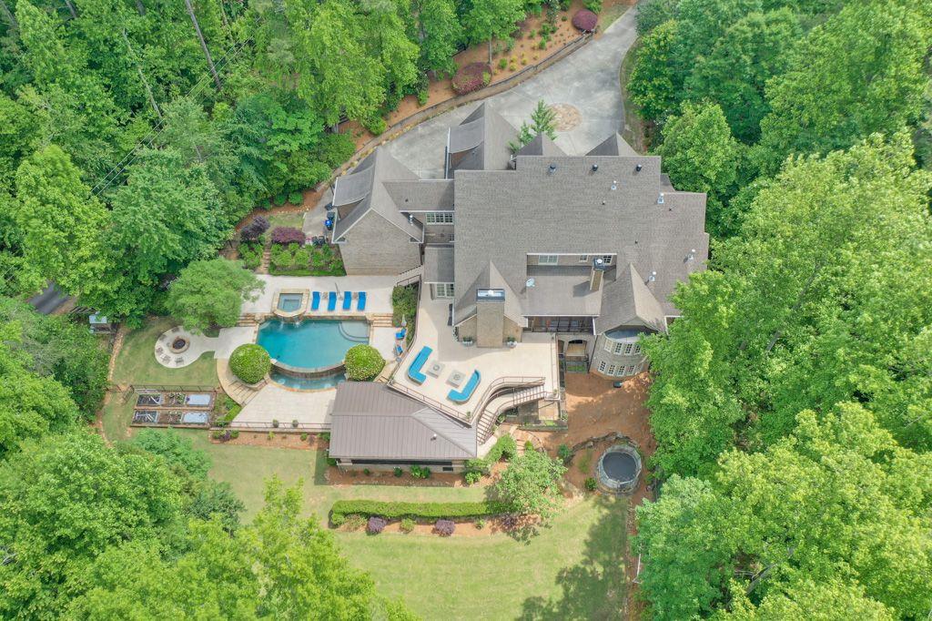 11015 Stroup Road Roswell, GA 30075 - Photo 87 of 113 an aerial view of a house with outdoor space and seating area
