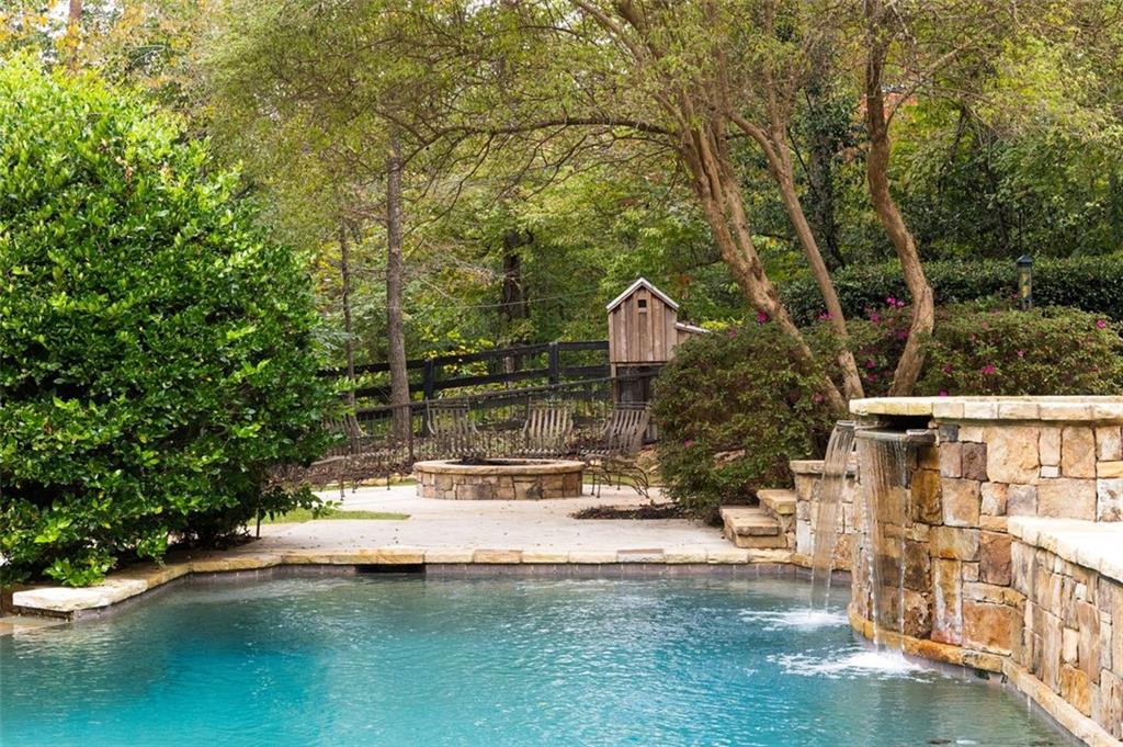 11015 Stroup Road Roswell, GA 30075 - Photo 95 of 113 a front view of a house with a yard