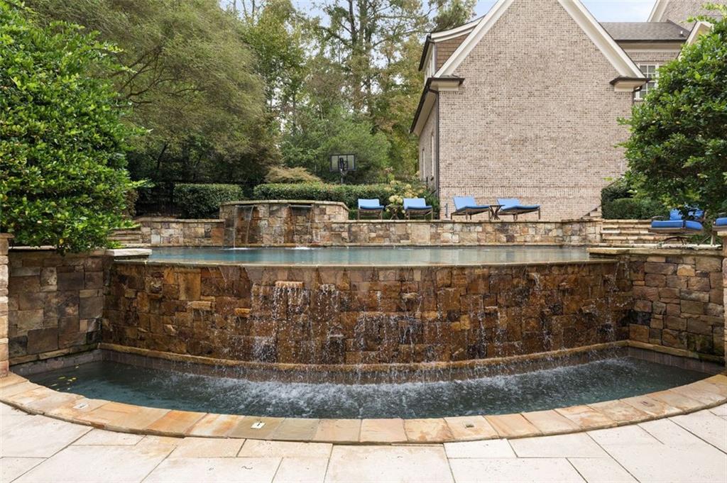 11015 Stroup Road Roswell, GA 30075 - Photo 98 of 113 a view of swimming pool with outdoor seating and plants