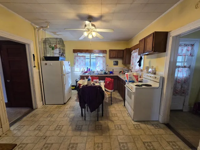 a room filled with furniture and a chandelier