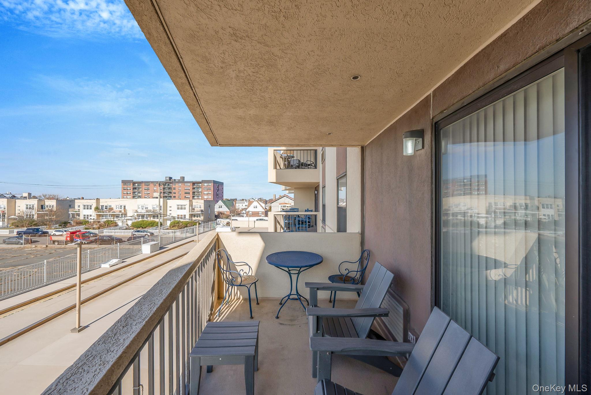 360 Shore Road, Unit 3H Long Beach, NY 11561 - Photo 16 of 23 a view of a kitchen and dining room