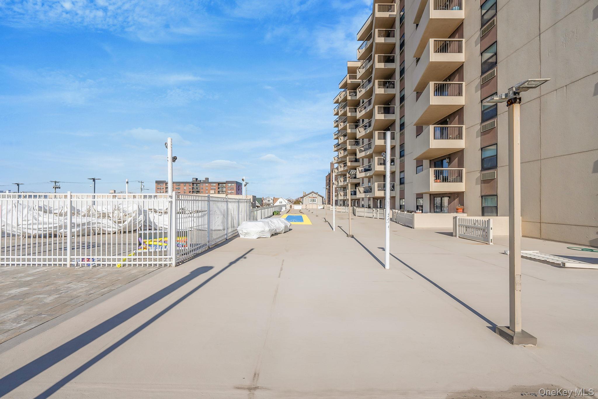 360 Shore Road, Unit 3H Long Beach, NY 11561 - Photo 6 of 23 a view of balcony with city view