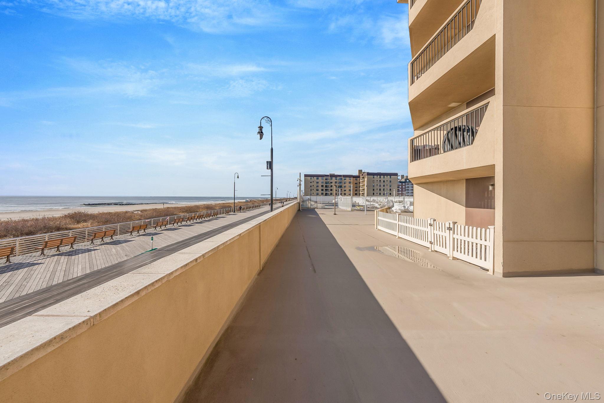 360 Shore Road, Unit 3H Long Beach, NY 11561 - Photo 7 of 23 a view of a city from a balcony
