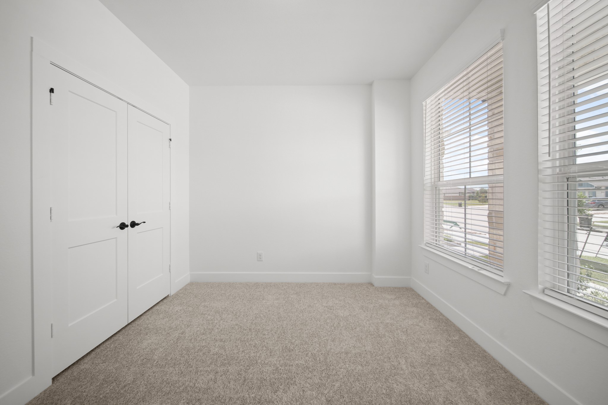 10111 Crescendo Way Manvel, TX 77578 - Photo 19 of 25 a view of an empty room with a window