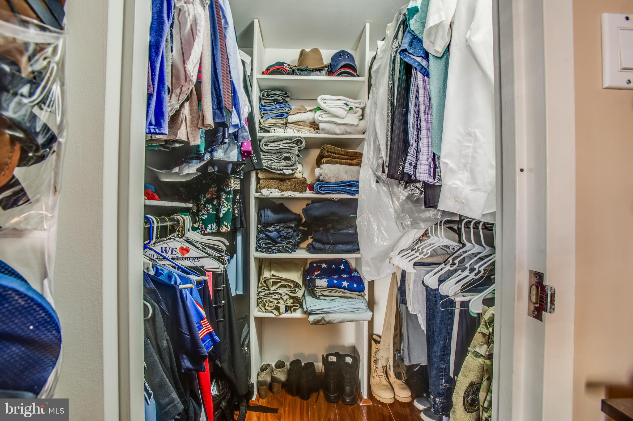 11623 Stoneview Square, Unit 11C Reston, VA 20191 - Photo 15 of 28 Walk-in closet in master bedroom