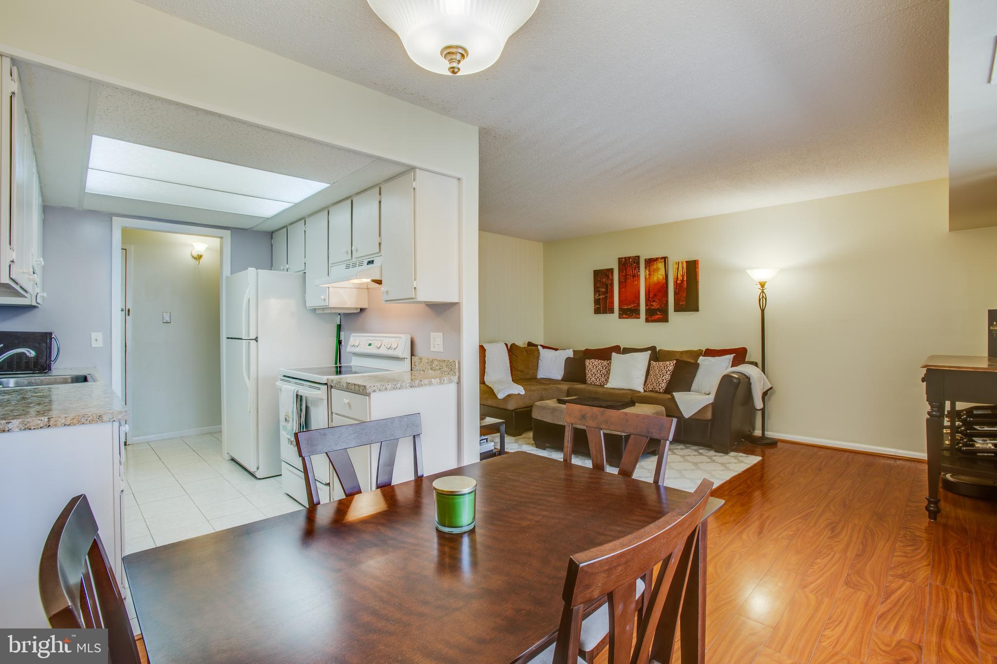 11623 Stoneview Square, Unit 11C Reston, VA 20191 - Photo 6 of 28 View of dining area, kitchen and living area