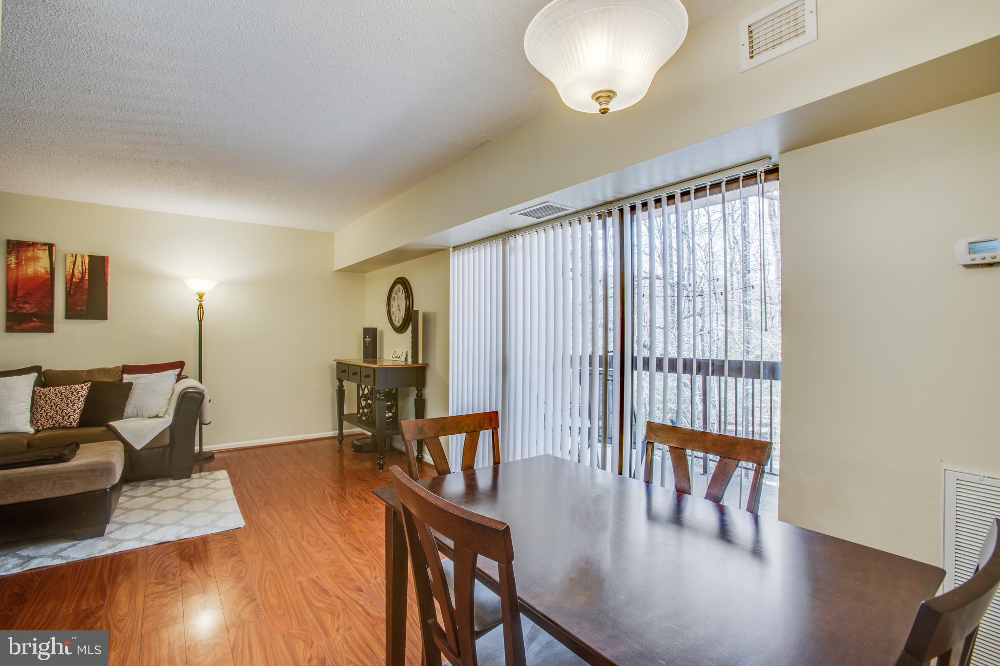 11623 Stoneview Square, Unit 11C Reston, VA 20191 - Photo 7 of 28 Dining area with view of balcony