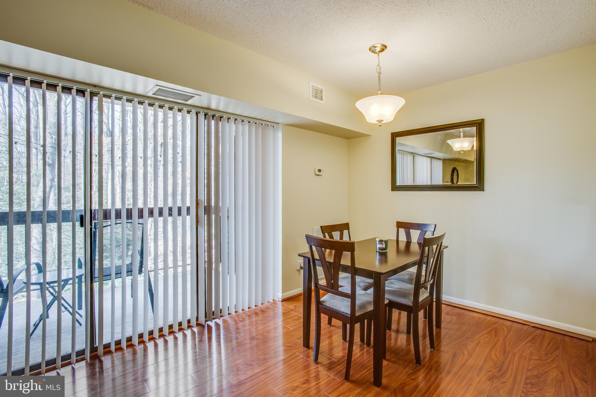 11623 Stoneview Square, Unit 11C Reston, VA 20191 - Photo 8 of 28 Ample dining space with beautiful view