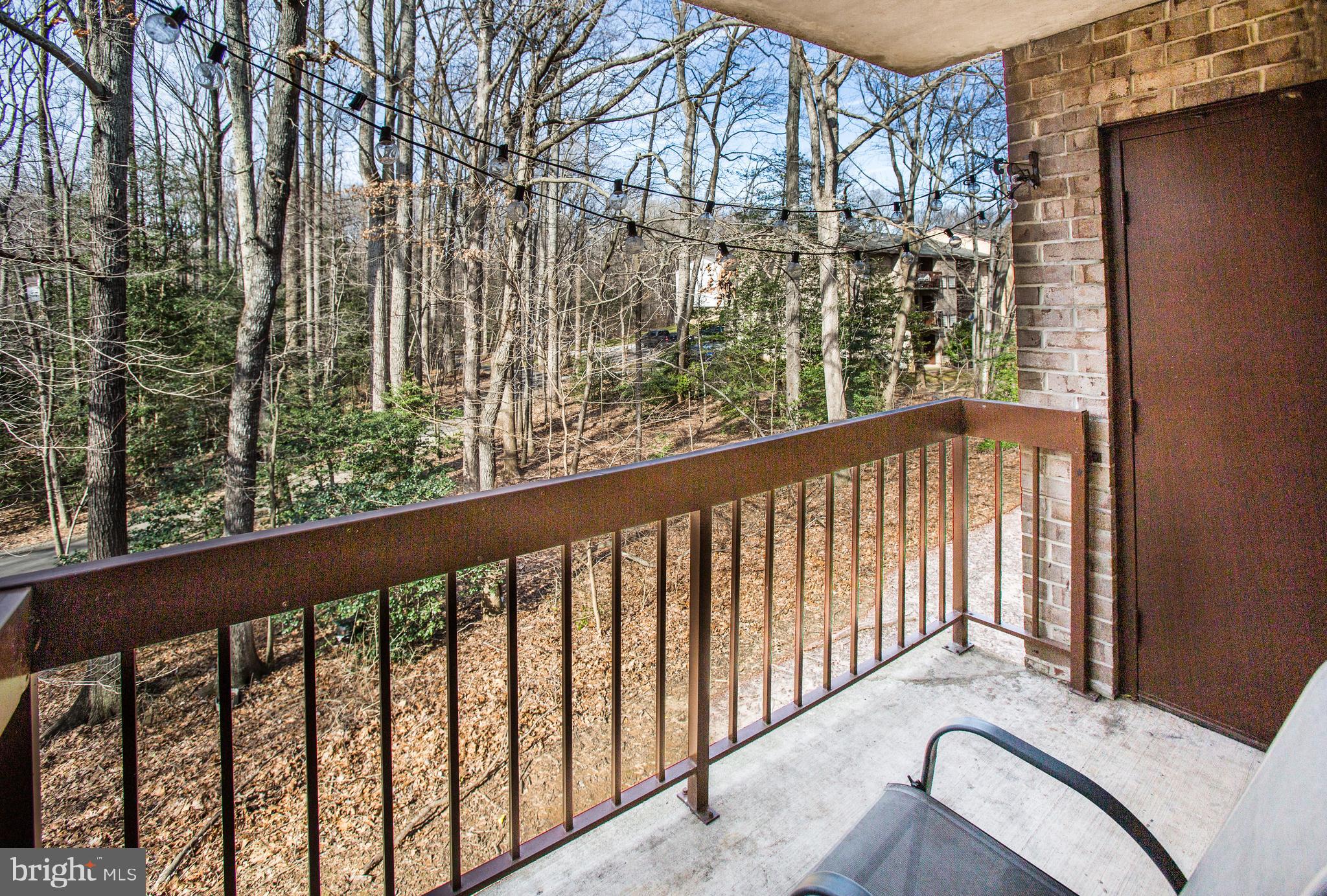 11623 Stoneview Square, Unit 11C Reston, VA 20191 - Photo 9 of 28 View off balcony. Trees create privacy
