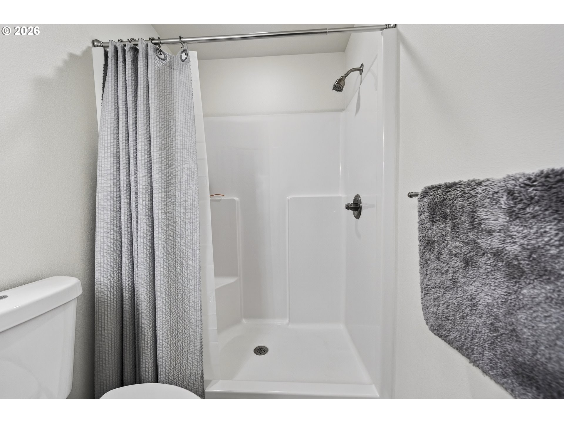 829 Jacobson Way Lakeside, OR 97449 - Photo 21 of 39 a bathroom with a shower and a toilet