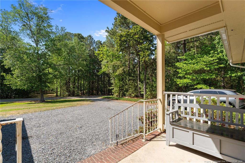 129 Overlook Road Cameron, NC 28326 - Photo 39 of 44 a view of a chairs and table in the balcony