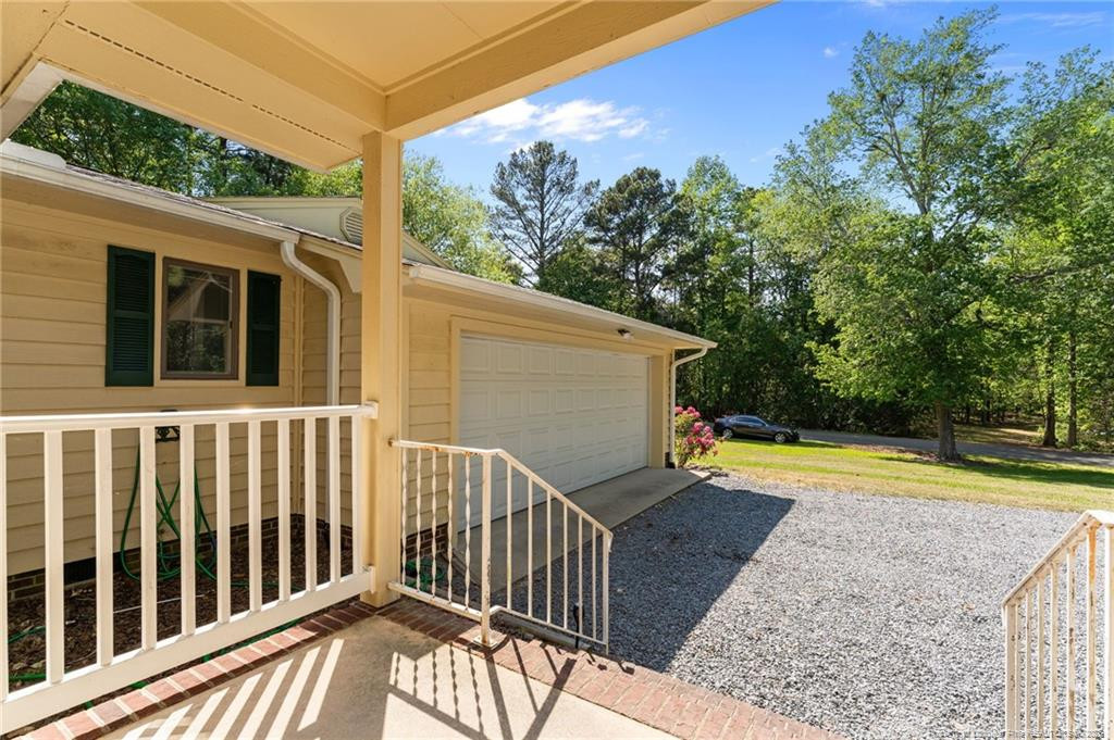 129 Overlook Road Cameron, NC 28326 - Photo 40 of 44 a view of a balcony with yard