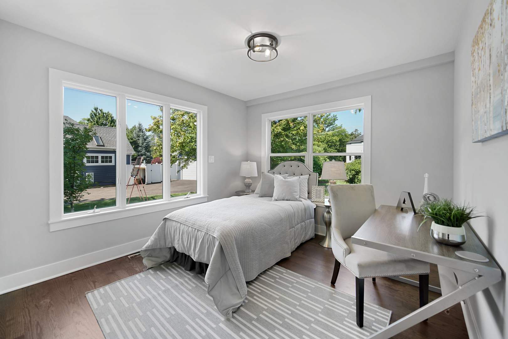 618 Revere Road Glenview, IL 60025 - Photo 12 of 22 a bedroom with a bed and a window