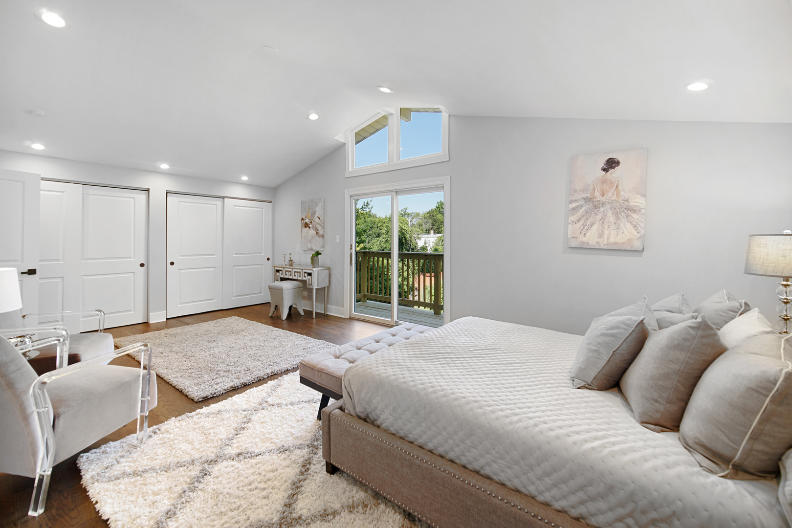 618 Revere Road Glenview, IL 60025 - Photo 16 of 22 a spacious bedroom with a large bed and a window