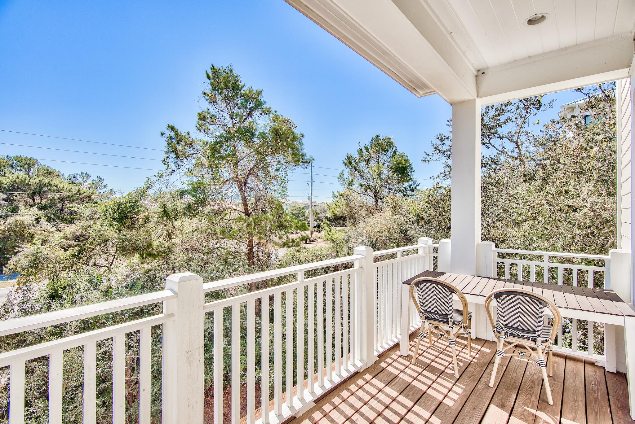 165 Sand Oaks Circle Santa Rosa Beach, FL 32459 - Photo 12 of 54 a view of a balcony with wooden floor