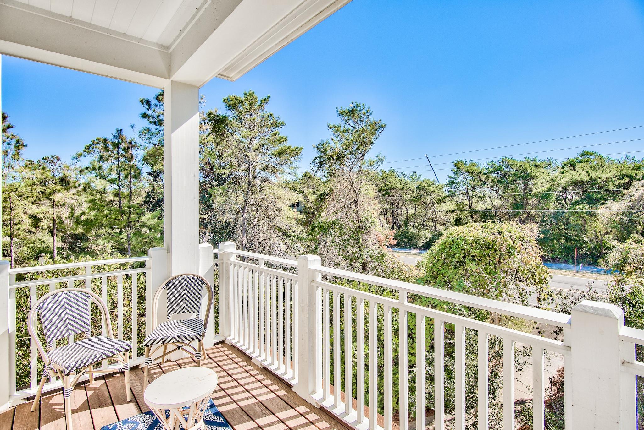 165 Sand Oaks Circle Santa Rosa Beach, FL 32459 - Photo 13 of 54 a view of a balcony with chairs