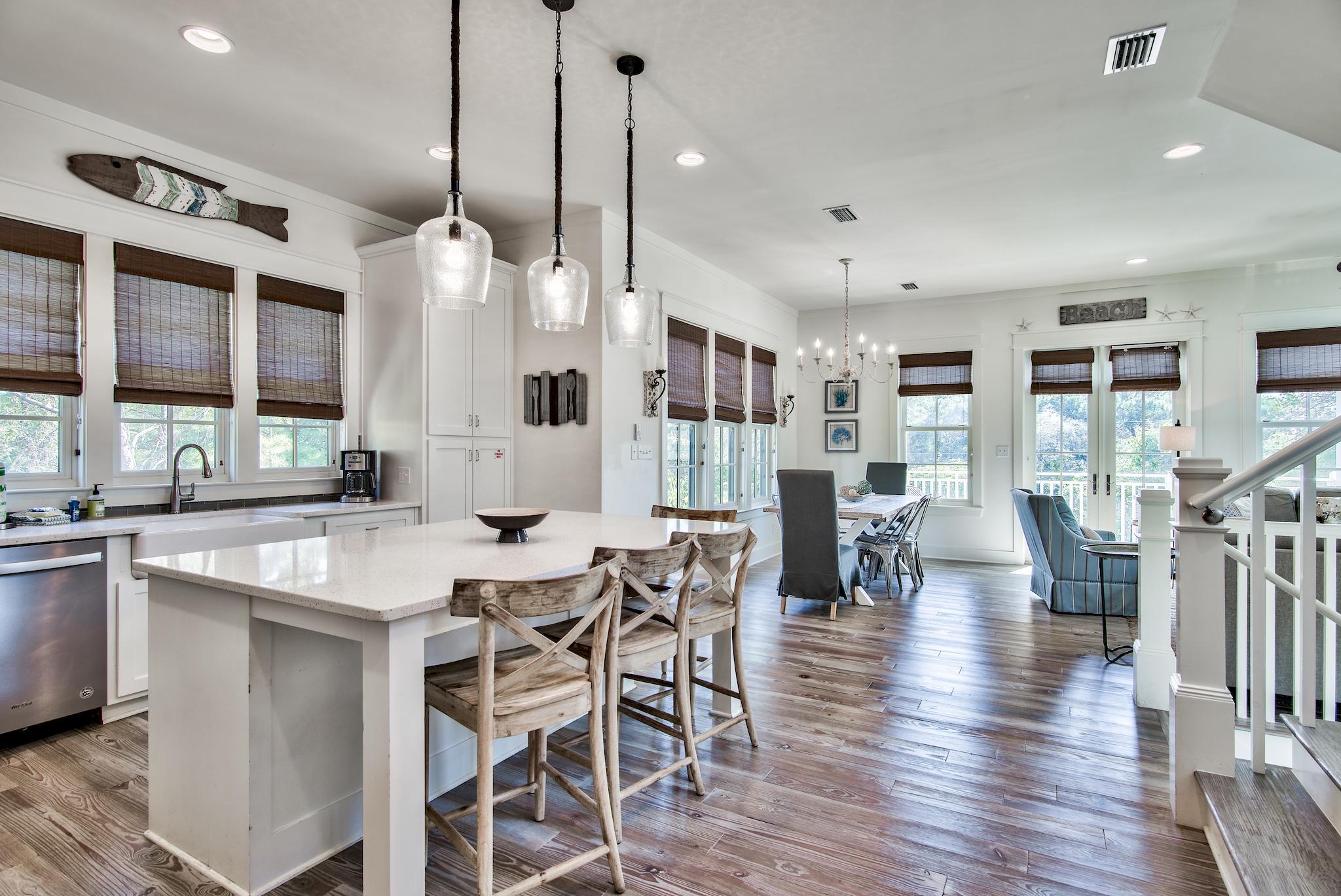 165 Sand Oaks Circle Santa Rosa Beach, FL 32459 - Photo 20 of 54 a kitchen with lots of counter space and painting on the wall