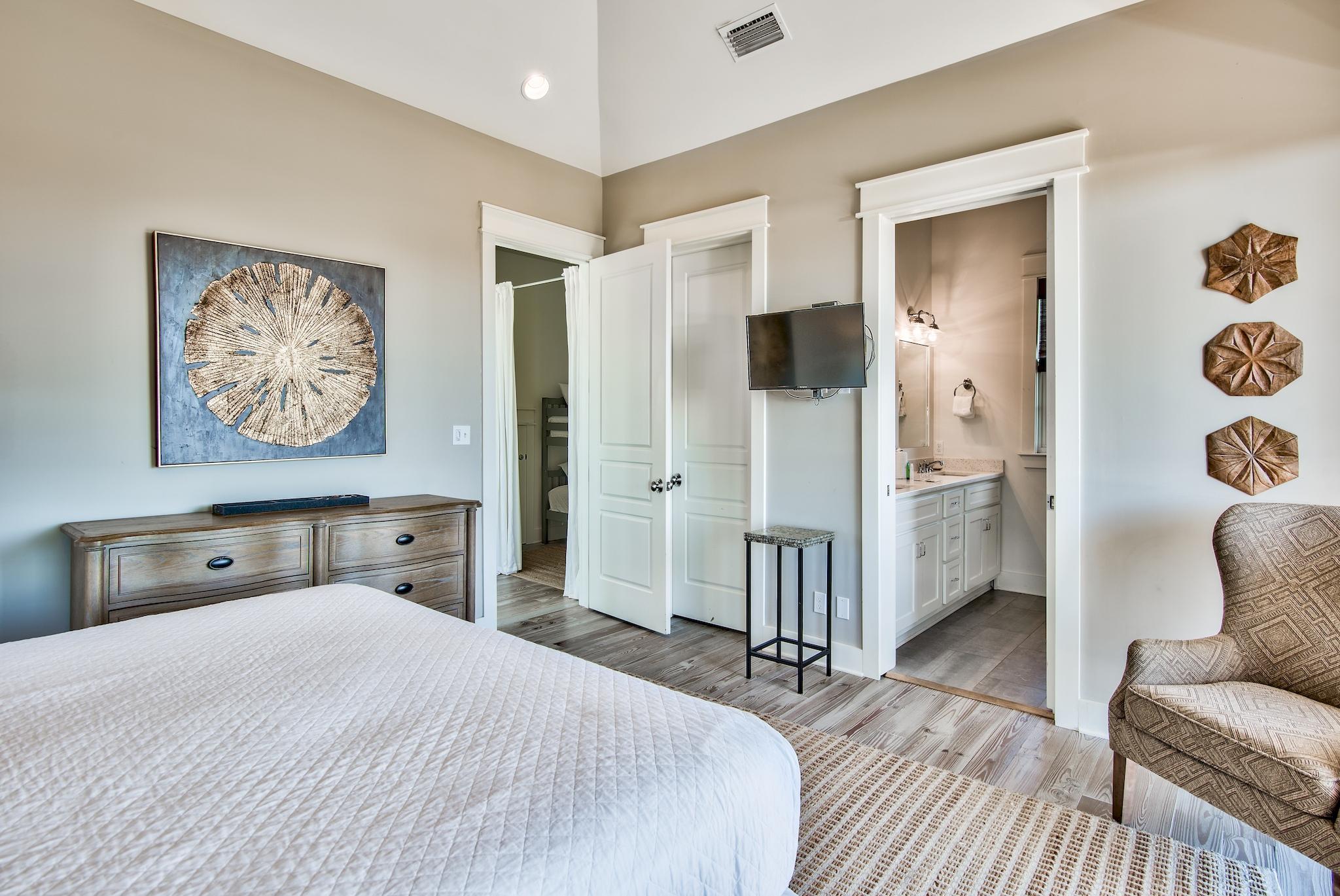 165 Sand Oaks Circle Santa Rosa Beach, FL 32459 - Photo 25 of 54 a bedroom with a bed and a couch
