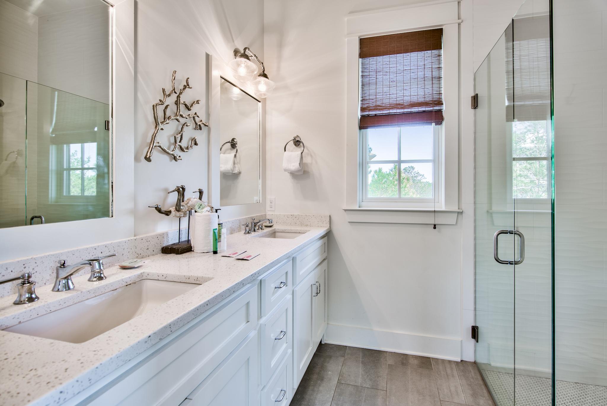 165 Sand Oaks Circle Santa Rosa Beach, FL 32459 - Photo 28 of 54 a bathroom with a granite countertop sink a shower and a mirror