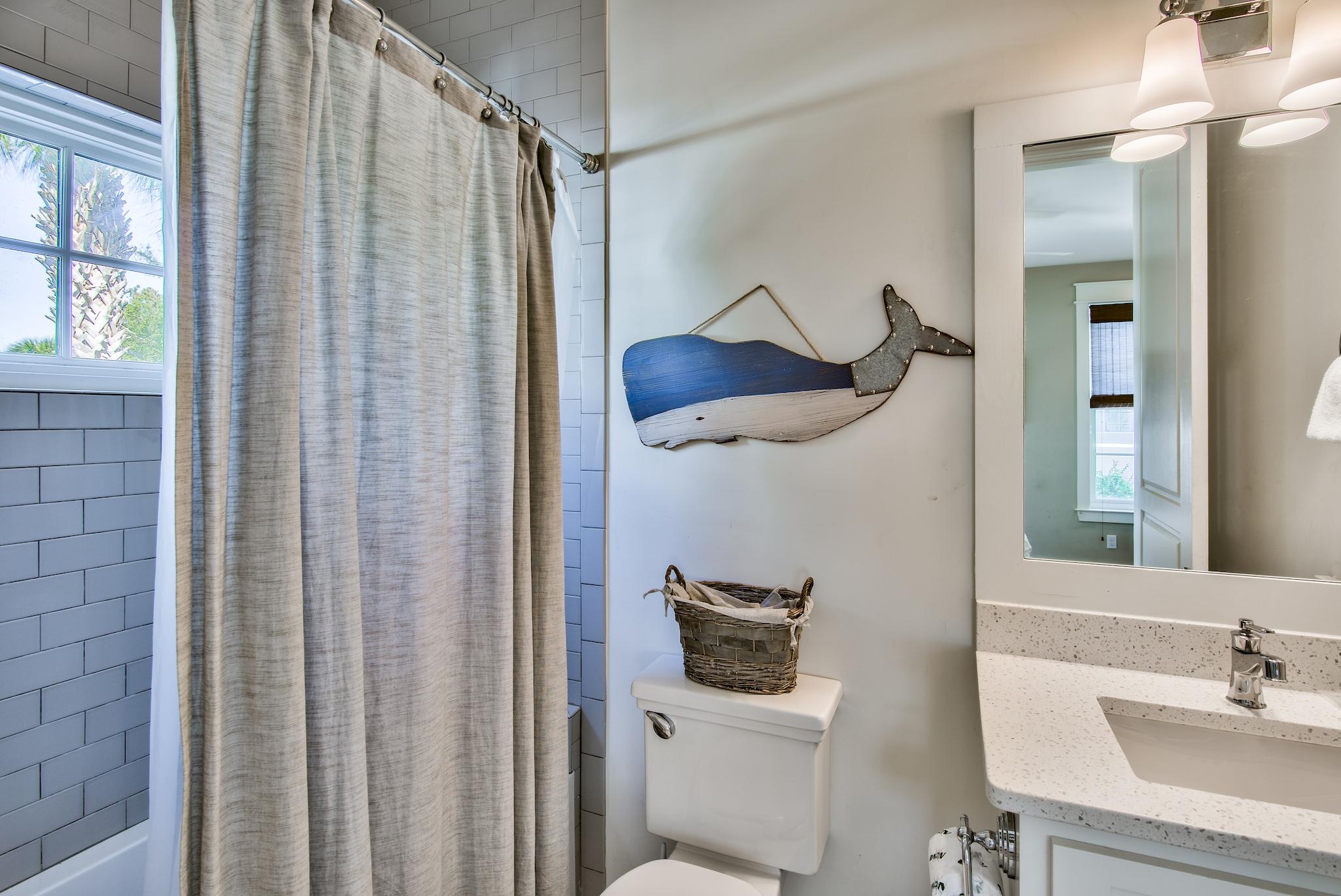 165 Sand Oaks Circle Santa Rosa Beach, FL 32459 - Photo 40 of 54 a bathroom with a toilet a sink and a mirror