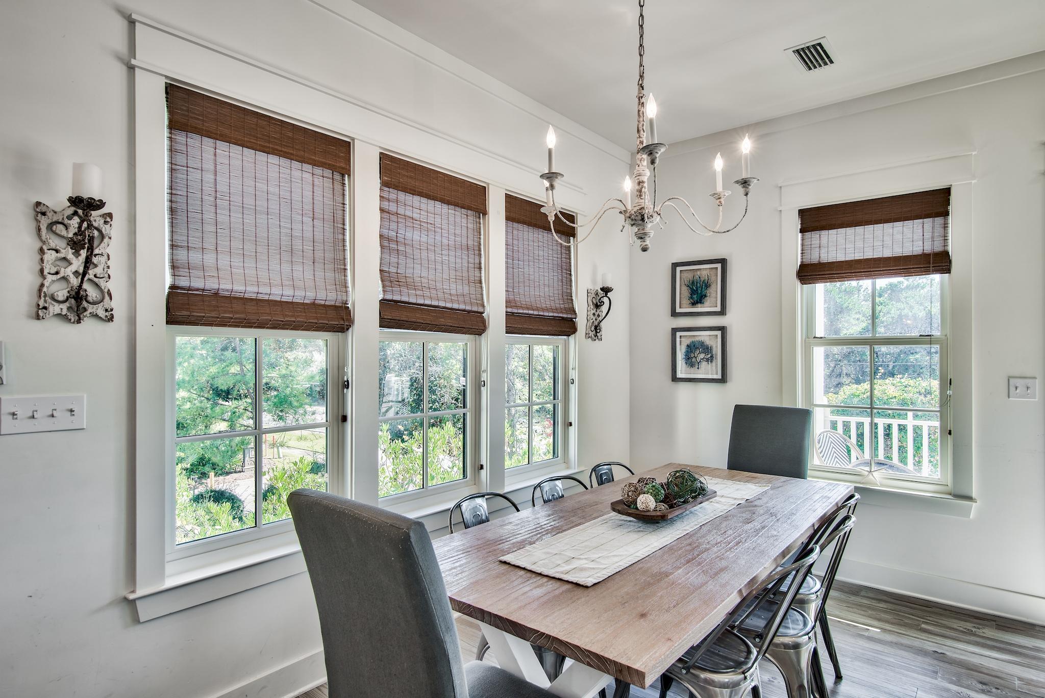 165 Sand Oaks Circle Santa Rosa Beach, FL 32459 - Photo 6 of 54 a view of a dining room with furniture window and outside view