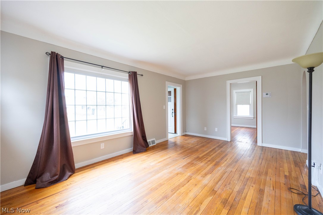 14474 Pease Road Maple Heights, OH 44137 - Photo 9 of 50 Spare room featuring light hardwood / wood-style floors
