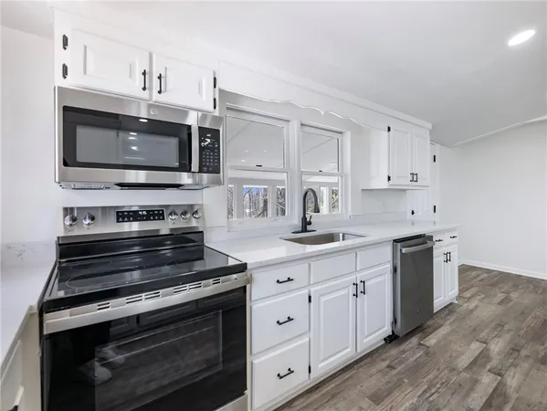 a view of small space with wooden floor