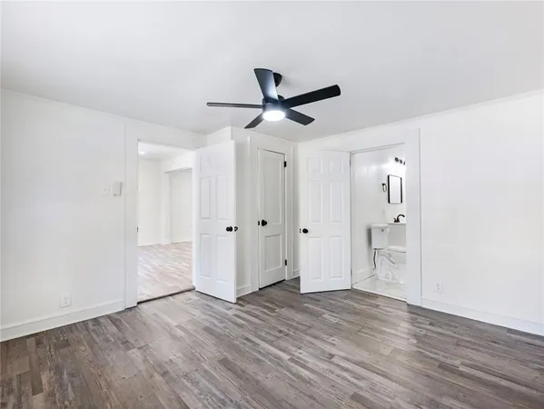 a view of an empty room with a window