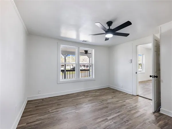 a bathroom with a shower and a sink