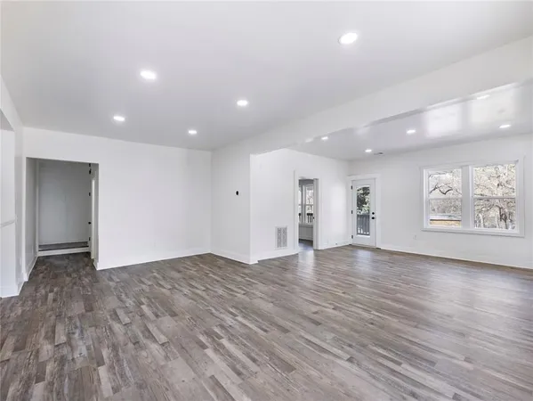 a view of kitchen with wooden floor