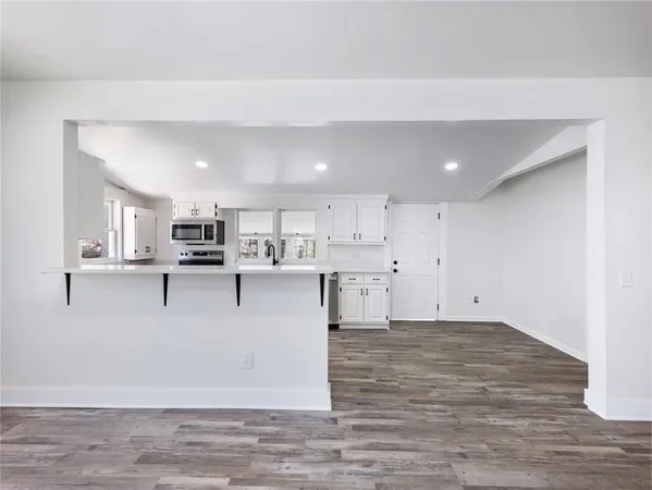 a large kitchen with a lot of counter space