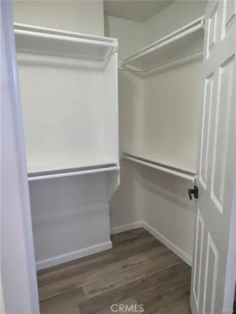 a view of an empty walk in closet