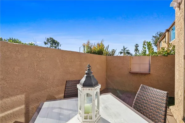 a picture of a table and chairs in patio