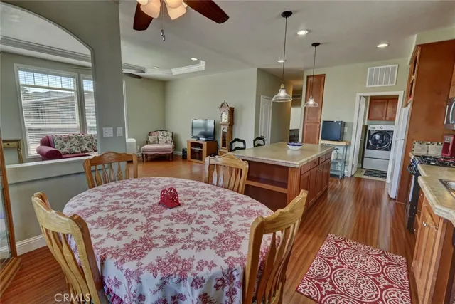 a dining room with furniture and window