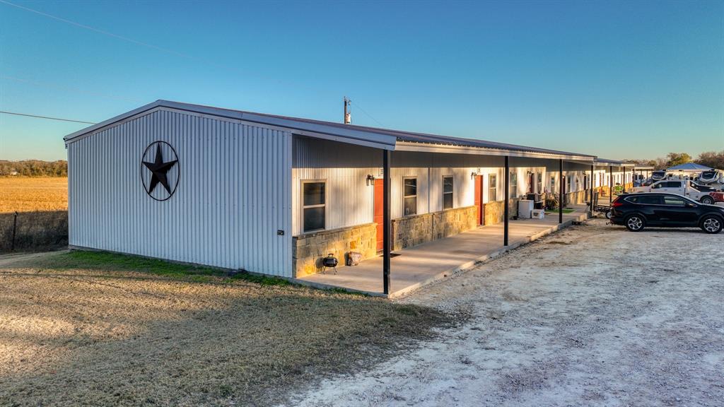 120 Bunkhouse Road Stephenville, TX 76401 - Photo 21 of 40 a view of a car garage